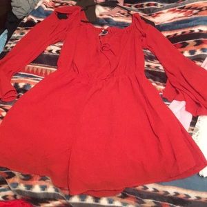 Red romper never been worn